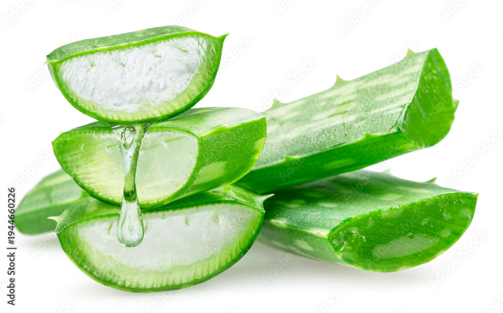Fototapeta premium Aloe vera slices and aloe gel dropping from slice isolated on white background.