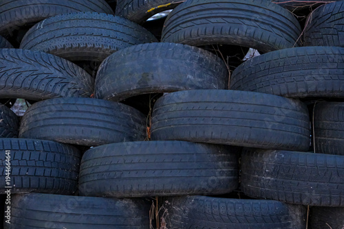 pile of black car tyres