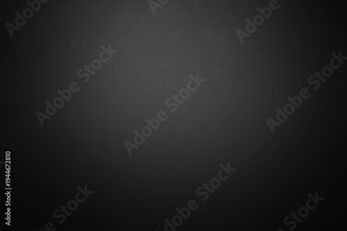 Black gray gradient background with soft vignette and subtle light center. Dramatic blank backdrop for modern design, technology presentations, luxury branding, elegant wallpaper. Ombre, blur effect