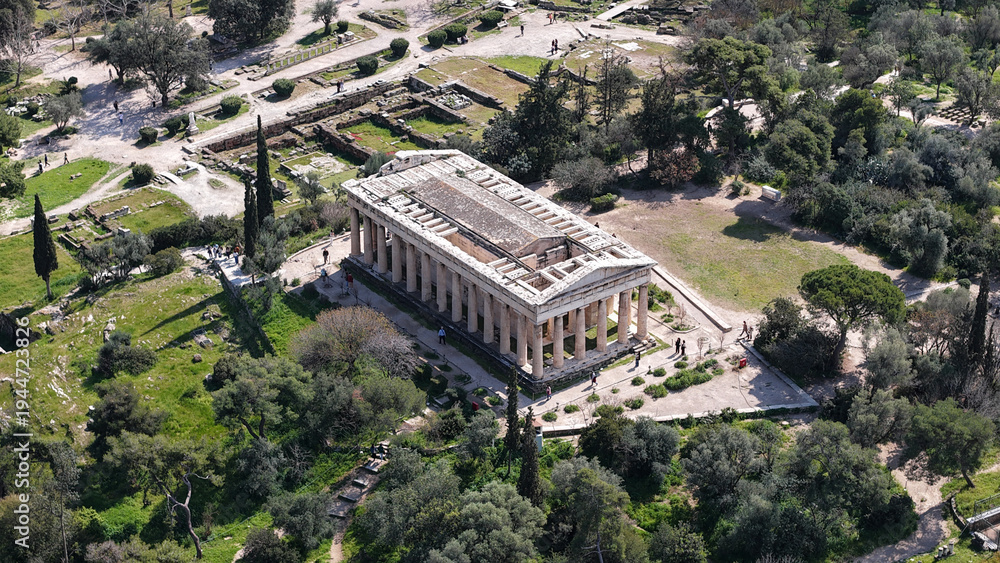 Fototapeta premium Aerial drone photo of iconic Temple of Hephaestus in Ancient Agora of Athens historic centre built below Acropolis hill , Attica, Greece