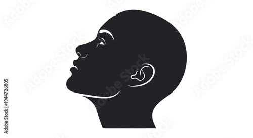 Black silhouette of a human head in profile looking upwards on a white background, depicting contemplation or aspiration.