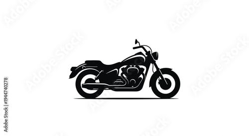 A striking black motorcycle design emphasizing form and power silhouette