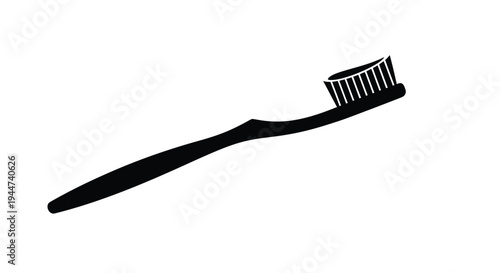 A sleek black toothbrush design presented in a stark silhouette