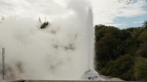 Steaming geothermal hot spring pool with mineral deposits at Wai-O-Tapu, New Zealand