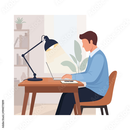 Man working on laptop at desk with desk lamp, home office setup, focused work
