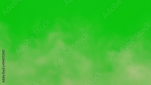 Green screen background with soft clouds in bright green color for video production