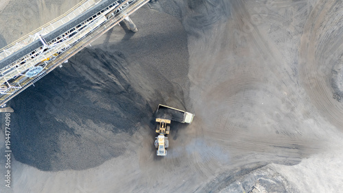 Drone footage from a coal mining site in South Kalimantan shows trucks and heavy equipment in action