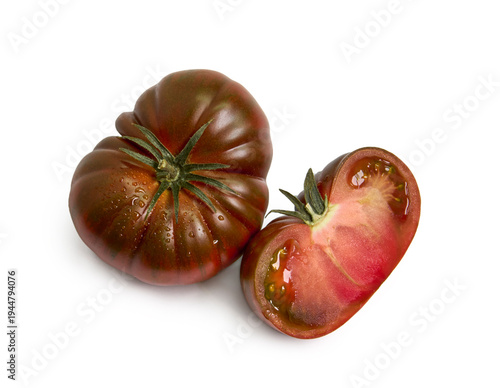 Whole and Halved Black Krim Tomato Isolated on White Background