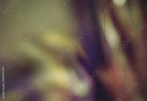 Fotografia Vintage film grain abstract background with blurred warm tones and scratches