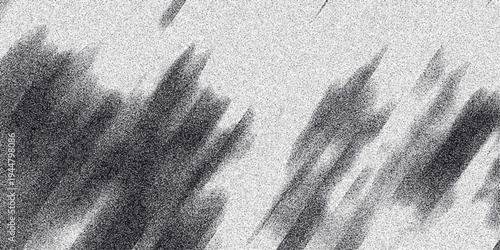 Abstract monochrome textured background with diagonal streaks of dark gray and black particles creating a sense of motion and atmospheric effect