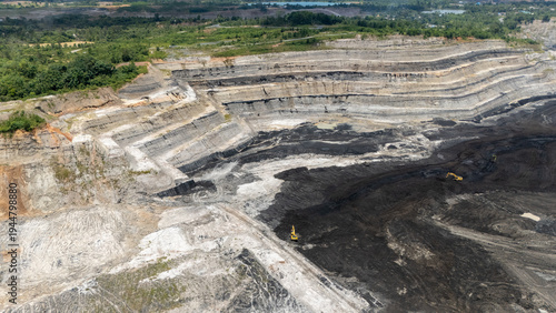 Photography Drone footage from a coal mining site in South Kalimantan shows trucks and heavy