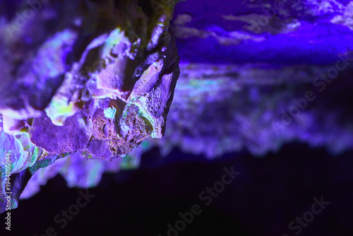 Macro Cave Wall with Black Light Glowing Minerals and Abstract Texture