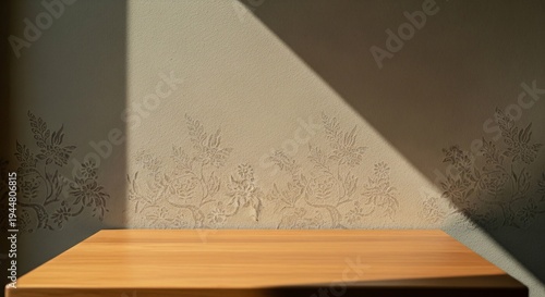 Wallpaper Mural Sunlight Cast on a Textured Wall with Floral Patterns and Wooden Surface Torontodigital.ca