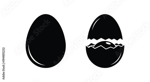 Two eggs one whole and one cracked in stark contrast silhouette