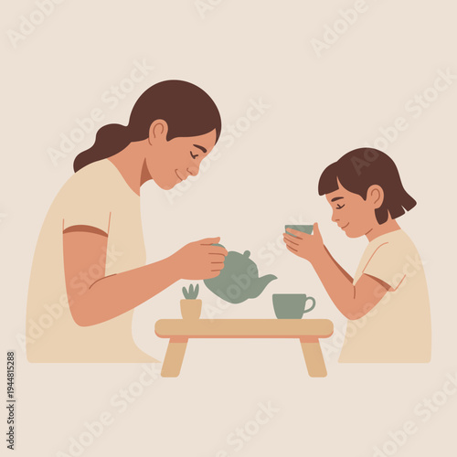 A mother and child are enjoying a quiet tea time together.