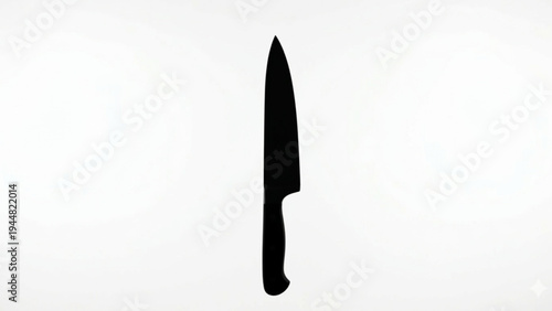 Black silhouette of a sharp professional chef knife isolated on white background