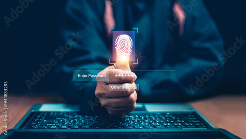 Biometric fingerprint authentication concept. Secure login verification with fingerprint scanning over laptop. Cybersecurity, identity verification, password protection and secure access technology.