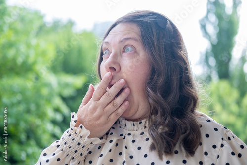 Tablou pe pânză close up portrait shocked mature woman with bulging eyes, surprised facial exagg