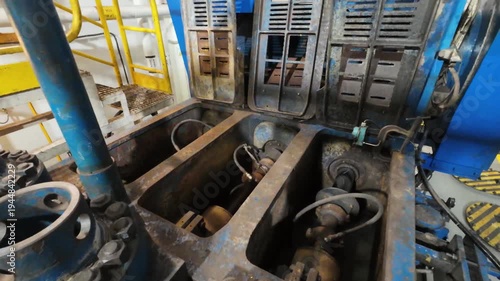 Triplex mud pumps for oil drilling rig in the pump room. A mud pump is one of the most important equipment on the rig.
