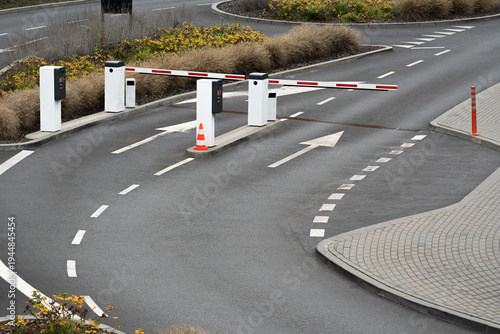 Parking barrier gate on roadway at entrance checkpoint