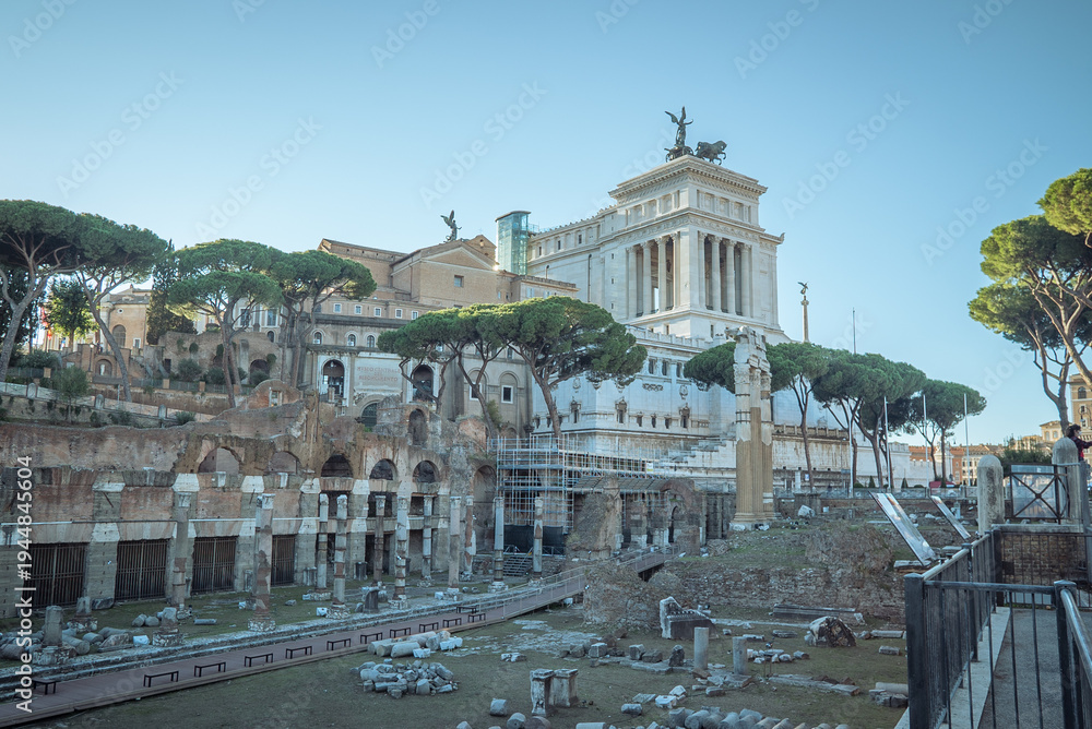 Fototapeta premium Rome, Italy: Ancient Roman ruins and modern monument in Rome