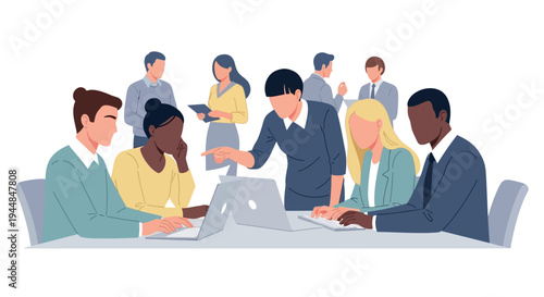 Business people discuss strategy around a laptop in meeting room