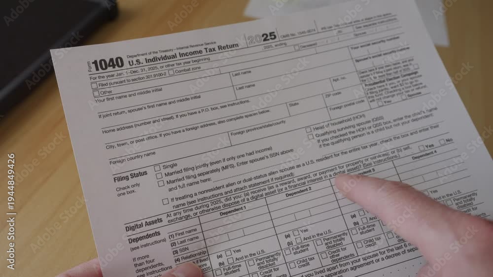 Man Filling In The Tax Form 1040. Person Calculates of Planning Budgets ...