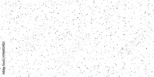 Dense monochrome mosaic background with numerous small irregular gray and white geometric tiles creating a textured abstract surface for design