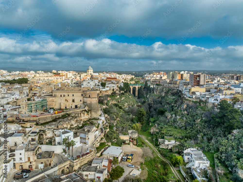 Obraz premium Aerial view Historic Massafra Castle: Medieval Fortress Byzantine Rock-Cut Architecture in Puglia’s Ravines. Top Italian Military Landmark Photography