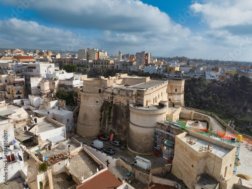 Принти на полотні Aerial view Historic Massafra Castle: Medieval Fortress Byzantine Rock-Cut Architecture in Puglia’s Ravines