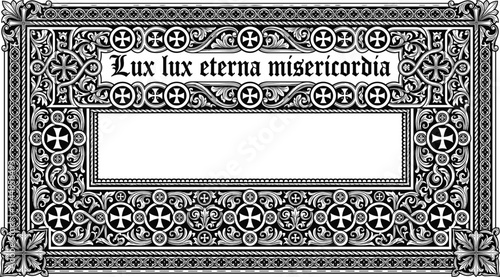 Ornate black and white Gothic decorative frame with floral and geometric motifs, Latin inscription, and central blank space, ideal for sacred art or design themes.