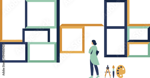 A woman in a green coat stands in front of a colorful arrangement of empty picture frames with art supplies.