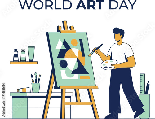 A man painting on a canvas in a studio to celebrate World Art Day with various art supplies around him.