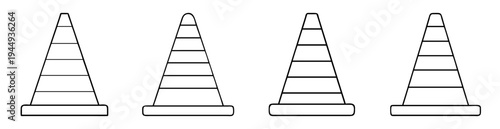 Four white and black simple traffic cones with horizontal stripes pattern
