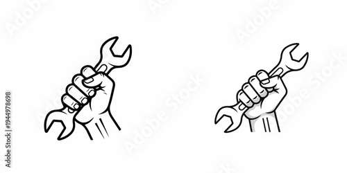 Hand holding a wrench, tool for mechanics and repair work