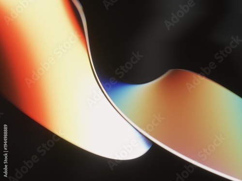 Abstract flowing wave shape with gradient colors on dark background