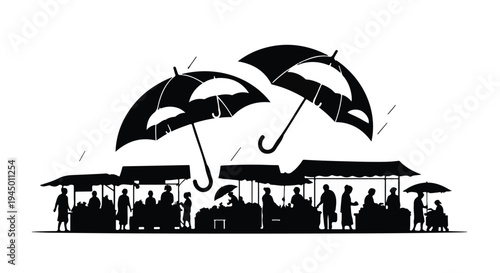 People huddle under umbrellas at an outdoor market during a rain shower.