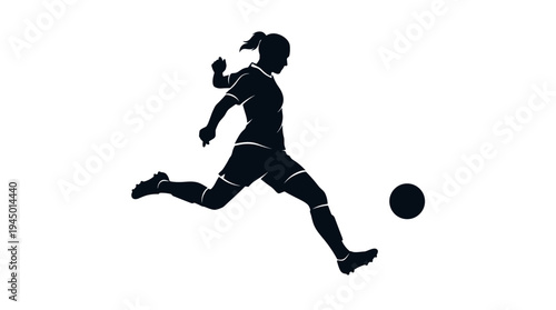 Female soccer player kicking a ball in action silhouette
