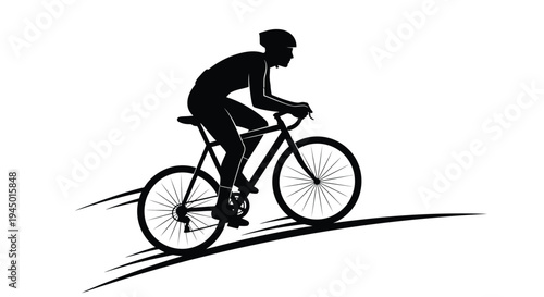A silhouetted cyclist rides a bicycle with speed and determination