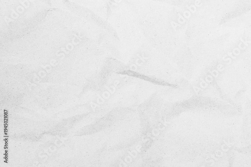 White recycled craft paper texture as background. Grey paper texture, Old vintage page or grunge vignette of old newspaper. Pattern rough art creased grunge letter. Hardboard with copy space for text.