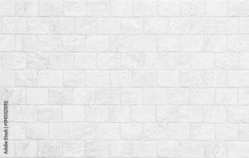 Kitchen wallpaper concept: Close up modern white brick tiles wall texture background, White brick wall texture background for stone tile block in grey light color wallpaper modern interior.