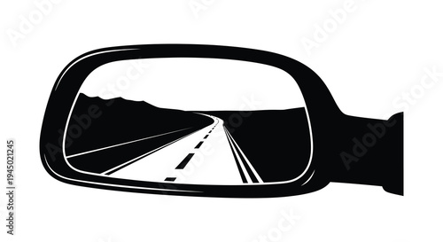 A car s side mirror reflects a winding road and distant mountains in stark silhouette high quality