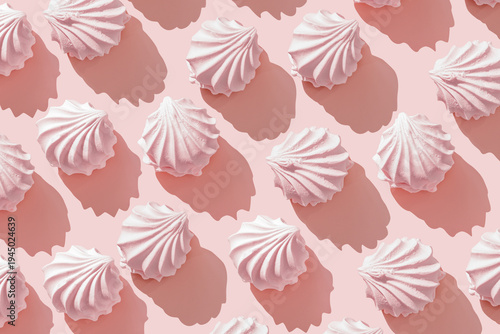 Fotografía Pink zephyr, marshmallow on Pastel Pink Background, Top view repeated pattern of