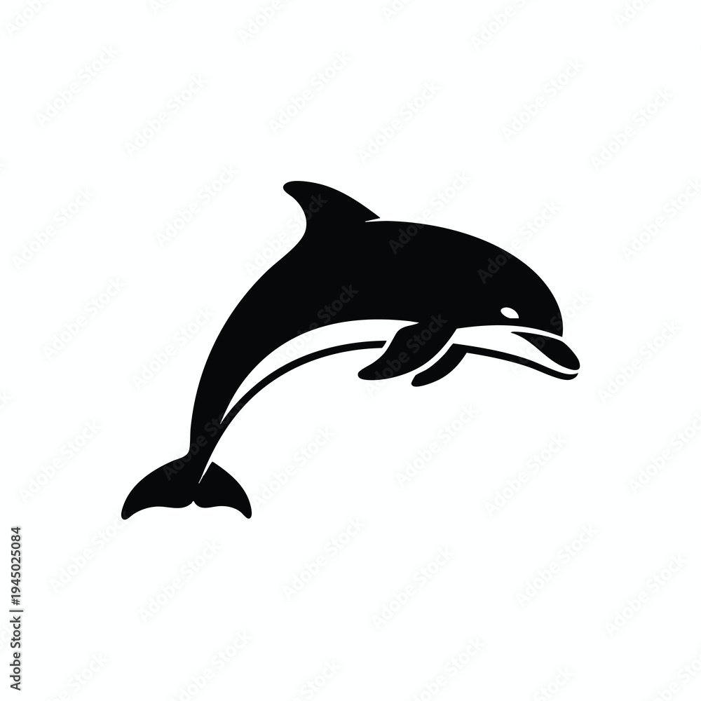 Obraz premium A sleek black dolphin leaps gracefully, its body curved, white accents highlight its form