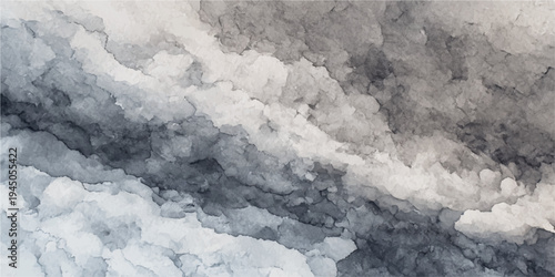 A breathtaking aerial view captures snow covered mountains rising toward a vibrant blue sky filled with fluffy white clouds during a crisp winter day