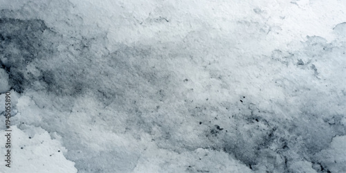 Abstract winter background featuring a grunge texture layered with frozen white snow and icy blue frost patterns under a bright cold sky