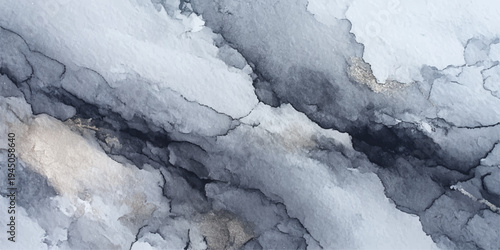 A frozen river and lake landscape under cloudy winter skies reveals a cold, snow-covered view of nature from high above