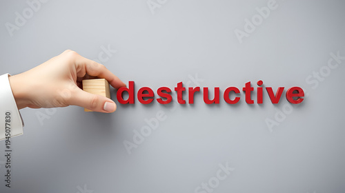 Destructive or constructive symbol. Male hand turns cubes and changes the word 'destructive' to 'constructive'. Business and constructive concept. Beautiful grey background, copy space.