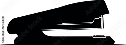 A black silhouette of a standard office stapler on a white background