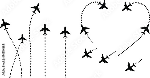 Airplanes flying in formation creating a heart shape and straight lines